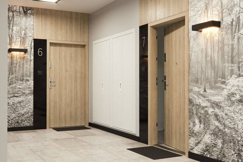 Jak wybrać drzwi wejściowe do mieszkania w bloku? [PORADNIK 2025: Bezpieczeństwo, Cisza, Design]